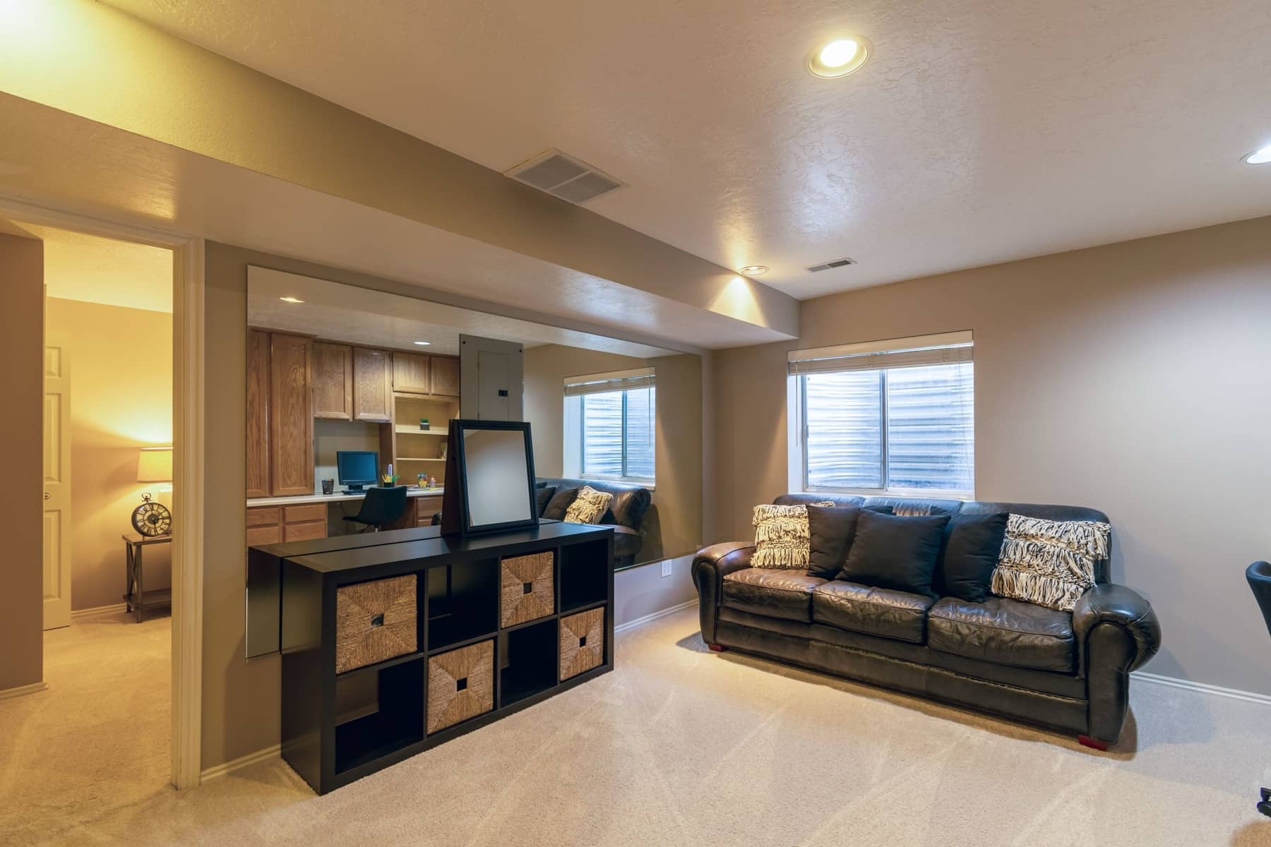 Finished basement family room with recessed lights and window wells, Sioux Falls area